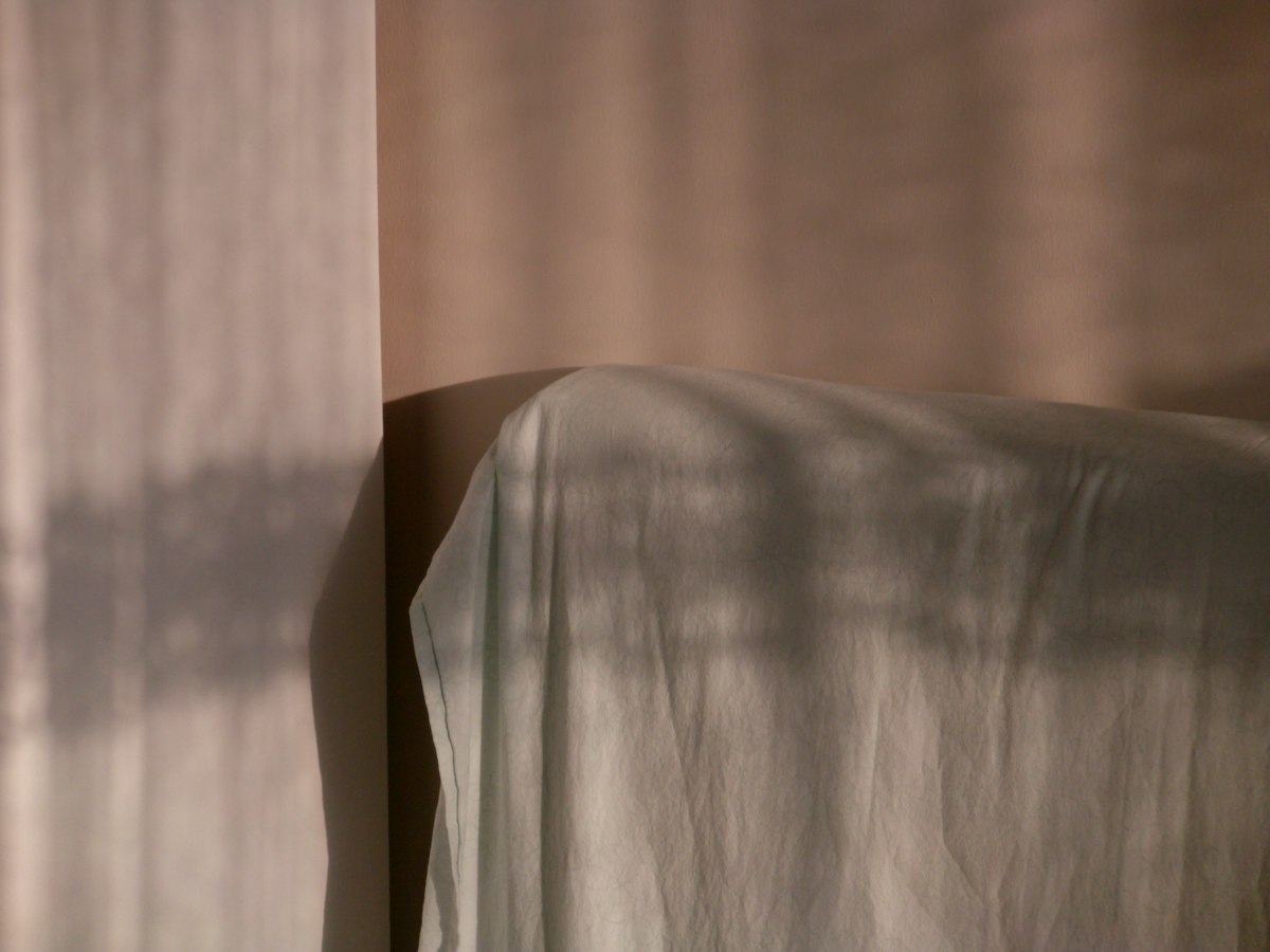 Morning light falling across linen